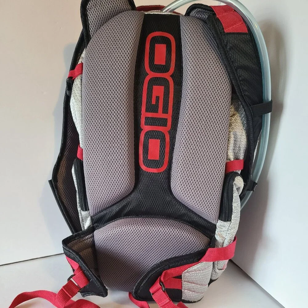 OGIO ATLAS 100 HYDRATION BACKPACK-100 OZ/ 3L BLADDER- CHROME-BLACK/RED ACCENTS